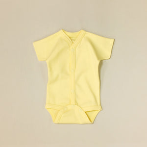Front snap opening yellow baby bodysuit