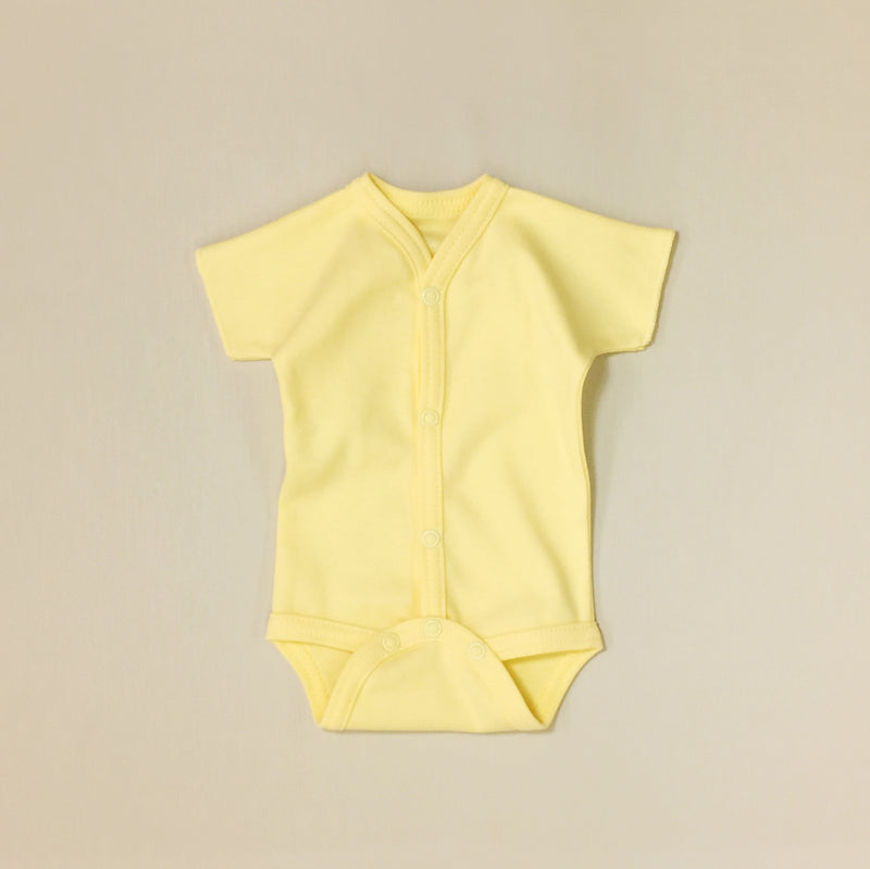 Front snap opening yellow baby bodysuit