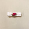 Elastic Lace headband with satin rosette for premature babies. Made in Canada