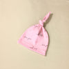 pink adjustable baby hat 