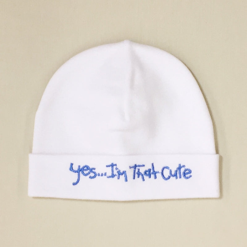 Yes I'm that cute embroidered baby hat in white with blue Made in Canada