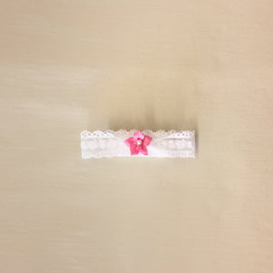 Elastic lace headband with satin flower for Cherry Velour Ruffled Dress.
